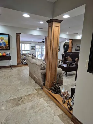 a kitchen with granite countertop a stove and cabinets
