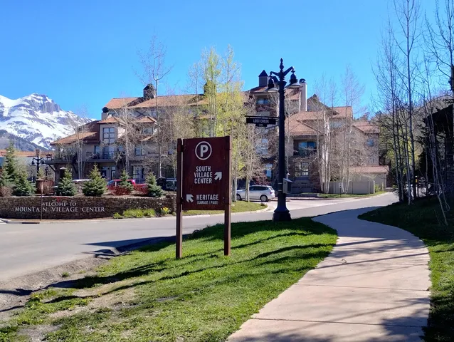 a view of a street with of houses