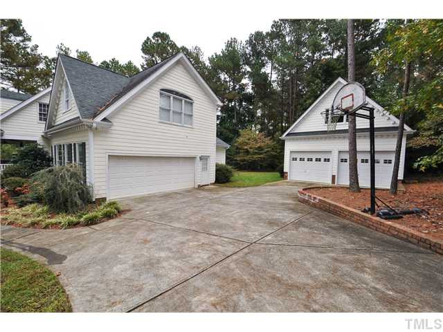 1805 Liatris Lane Raleigh, NC 27613 - Photo 23 of 25 With the attached and detached 2 car garages there is so much space and storage- perfect for boat storage! Parking Lot/Garage