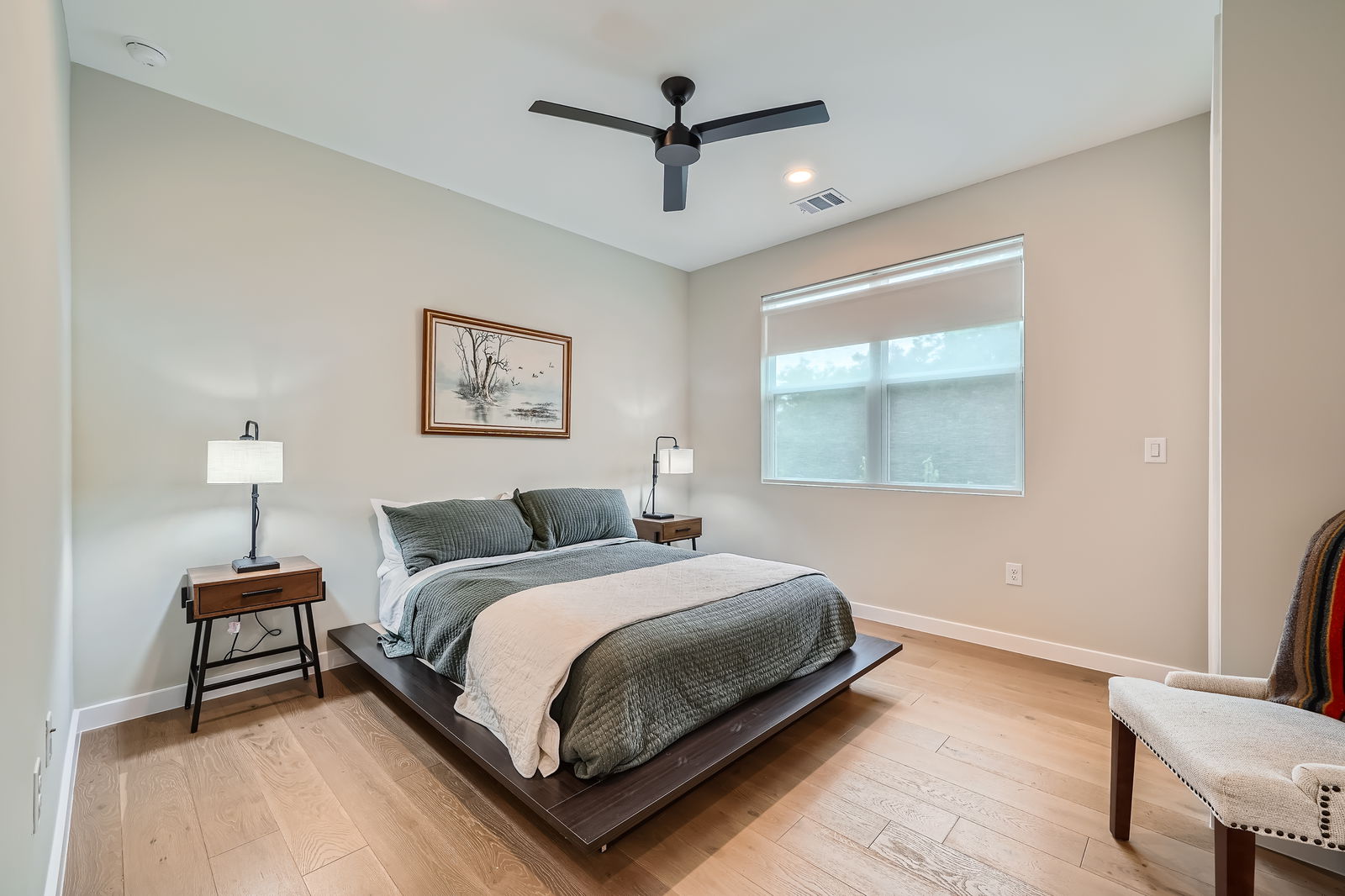 7507 Bethune Avenue, Unit B Austin, TX 78752 - Photo 17 of 23 Spacious second bedroom with beautiful wood floors.