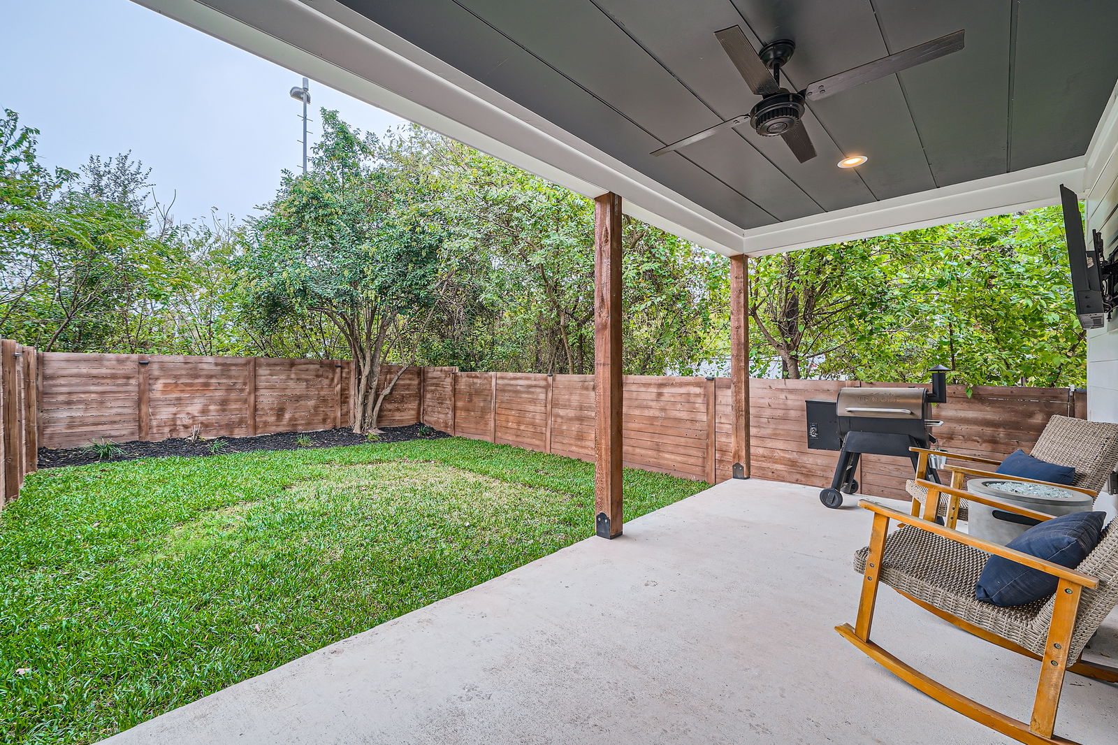 7507 Bethune Avenue, Unit B Austin, TX 78752 - Photo 19 of 23 View of patio featuring a fenced backyard and ceiling fan