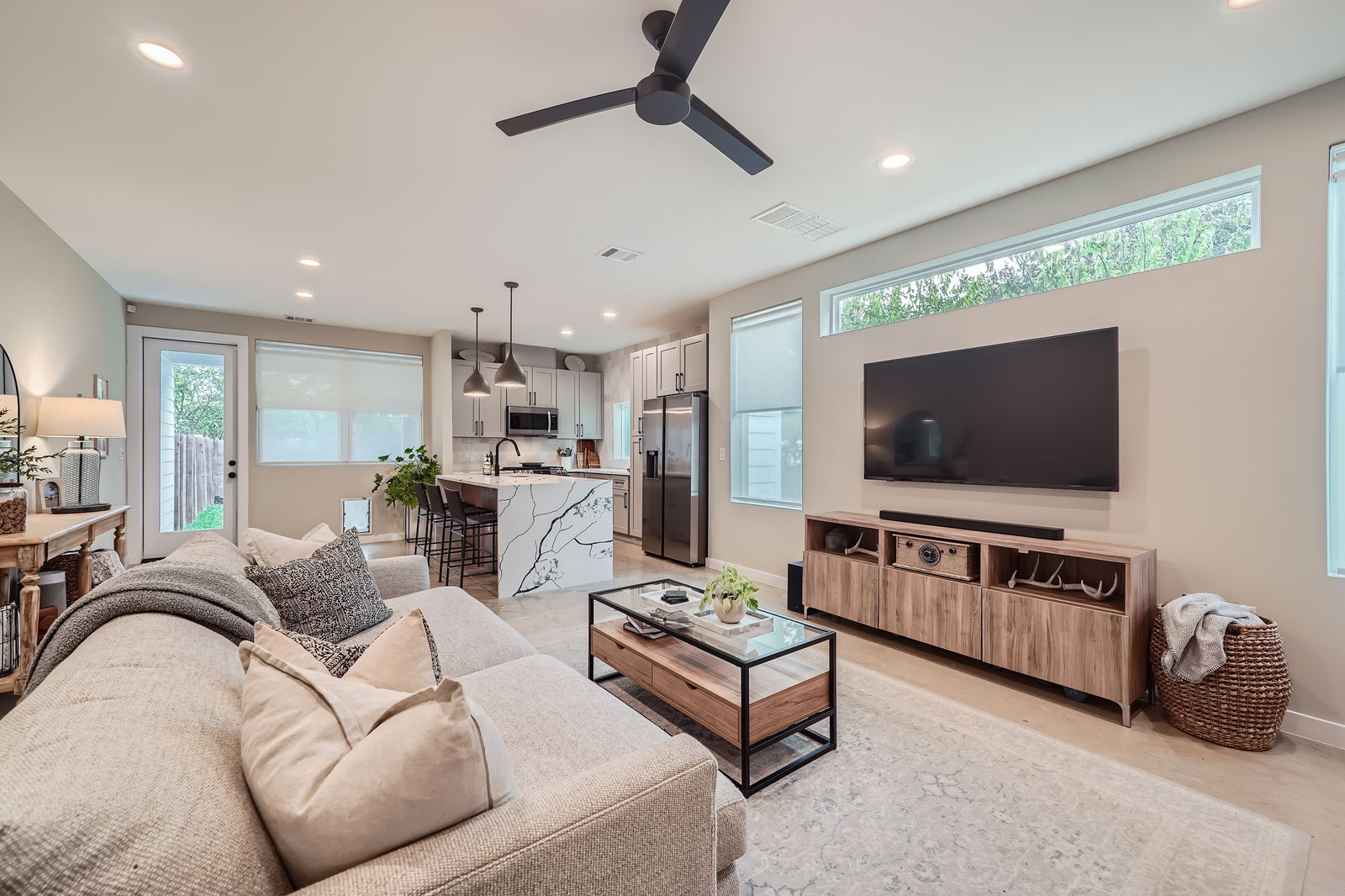 7507 Bethune Avenue, Unit B Austin, TX 78752 - Photo 7 of 23 Spacious living room with recessed lighting.