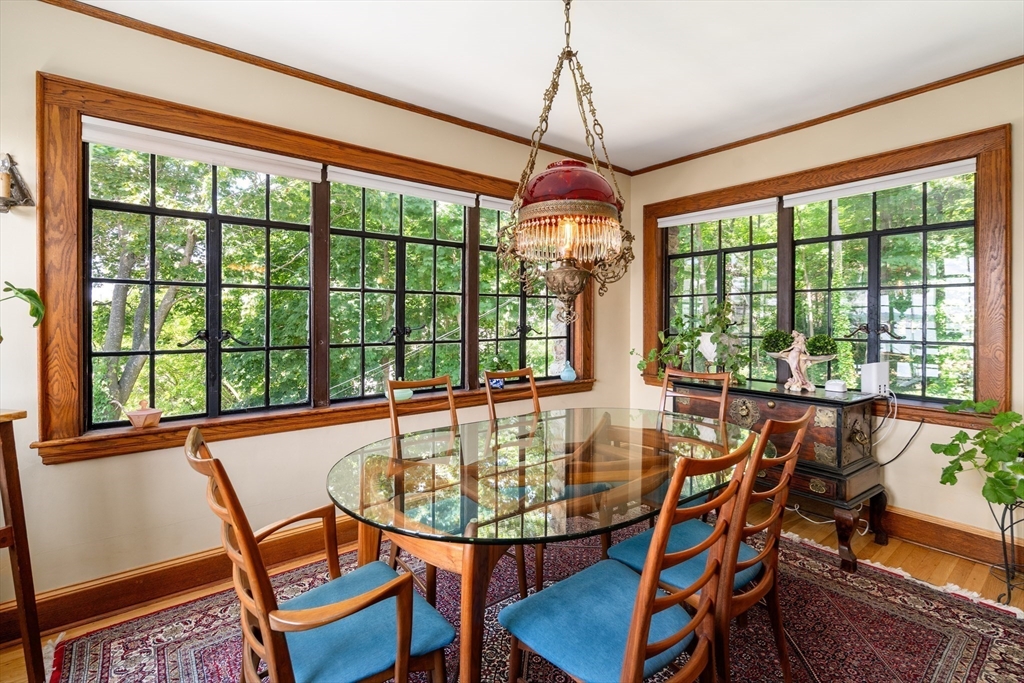 63 Crabtree Road Quincy, MA 02171 - Photo 8 of 41 a view of a dining room with furniture window and outside view