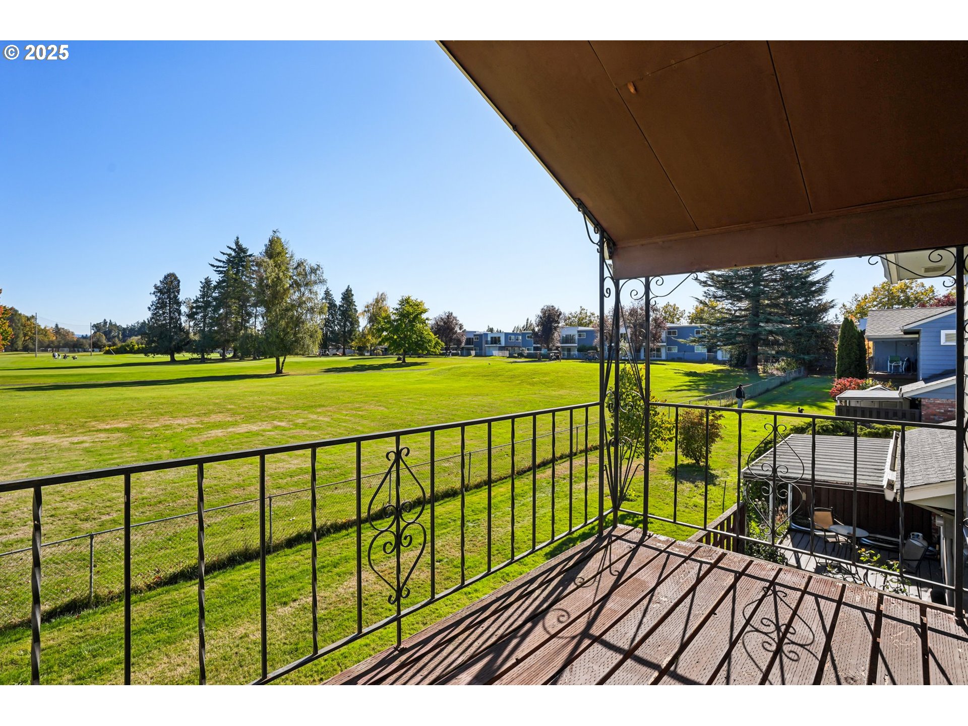 1302 Northeast Hogan Drive, Unit 169 Gresham, OR 97030 - Photo 35 of 46 a view of a chairs and table on the terrace
