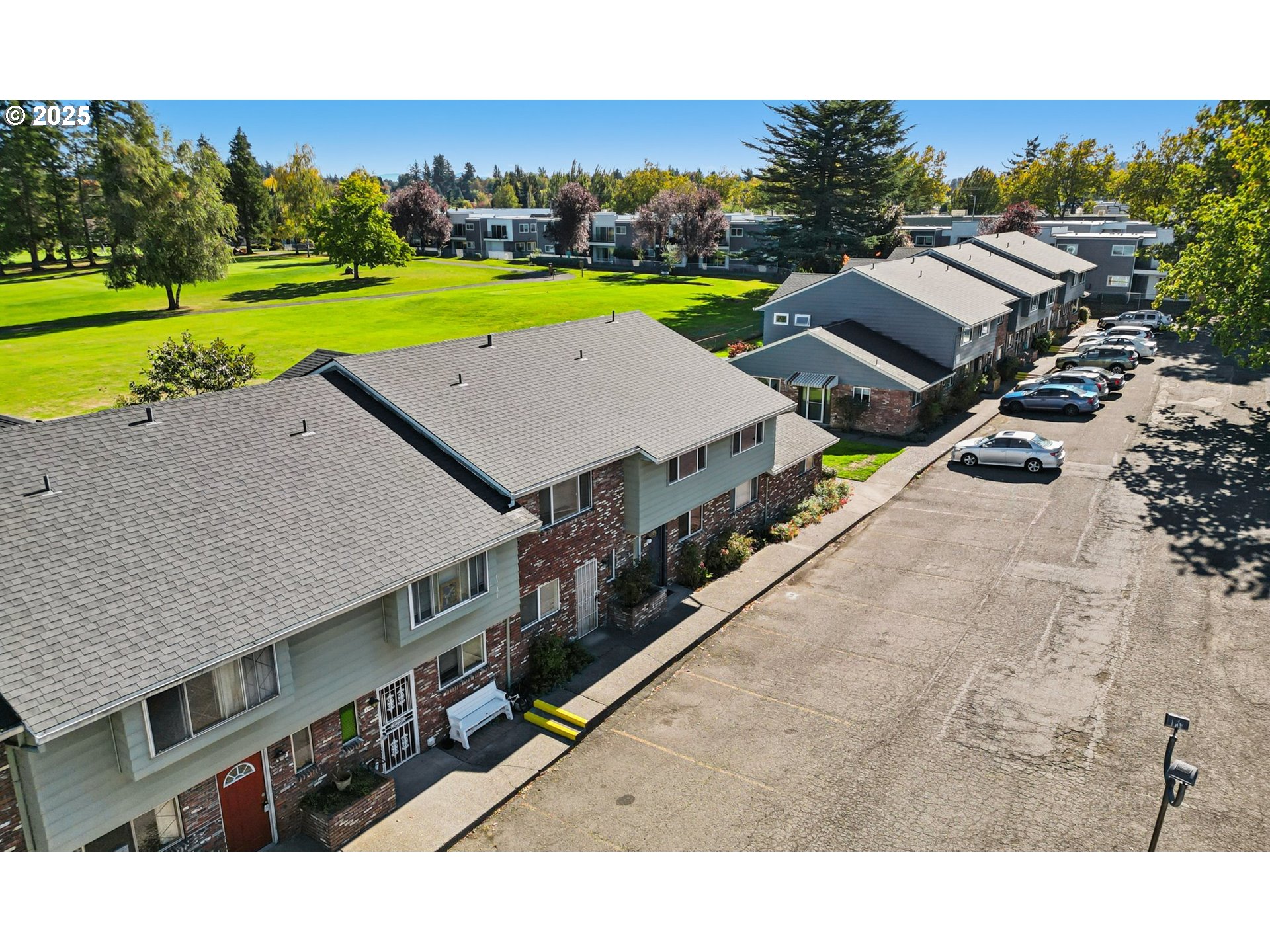 1302 Northeast Hogan Drive, Unit 169 Gresham, OR 97030 - Photo 38 of 46 a view of a city with an outdoor space