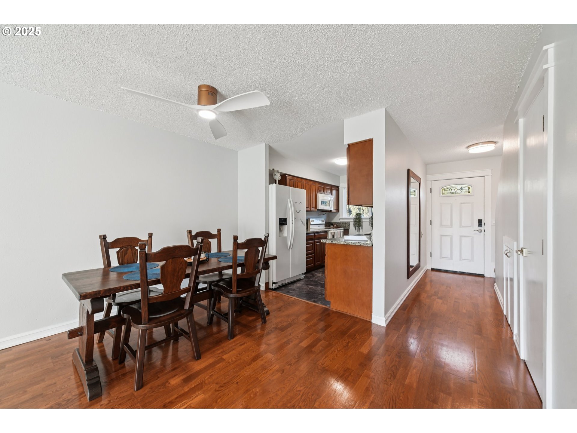 1302 Northeast Hogan Drive, Unit 169 Gresham, OR 97030 - Photo 5 of 46 a view of a dining room with furniture
