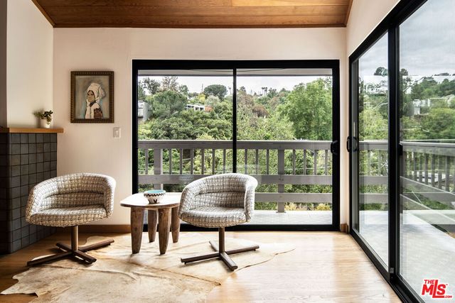 a workspace with furniture and a window