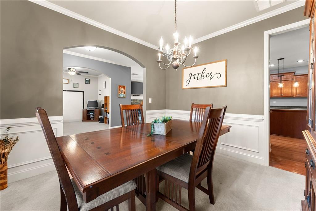 725 Larry Lane Winder, GA 30680 - Photo 12 of 62 a view of a dining room with furniture