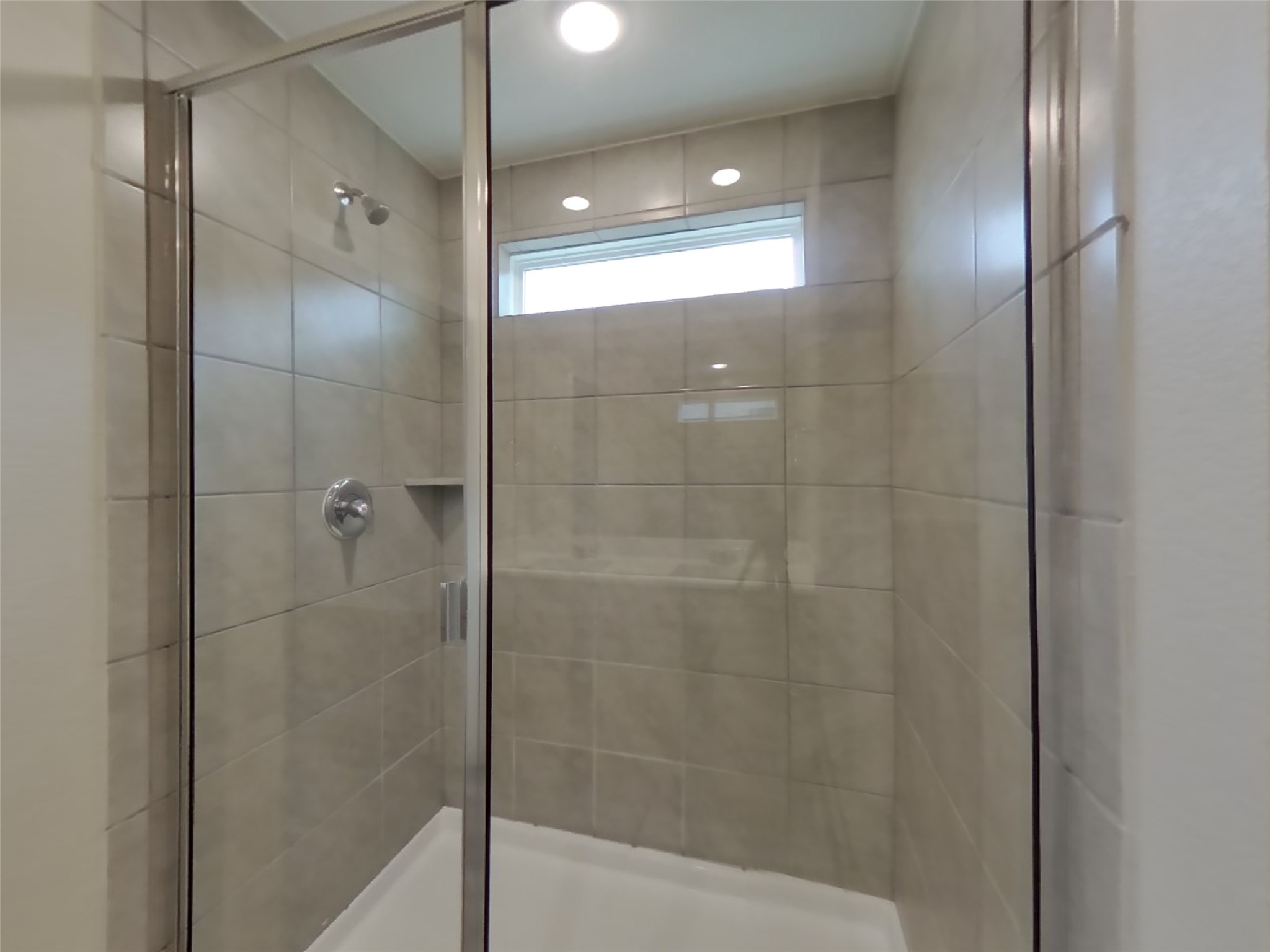509 Raglands Road Leander, TX 78641 - Photo 8 of 18 a bathroom with a shower