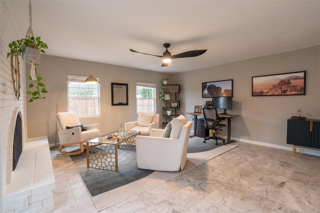 3124 Barton Road Carrollton, TX 75007 - Photo 13 of 36 a living room with furniture and a flat screen tv