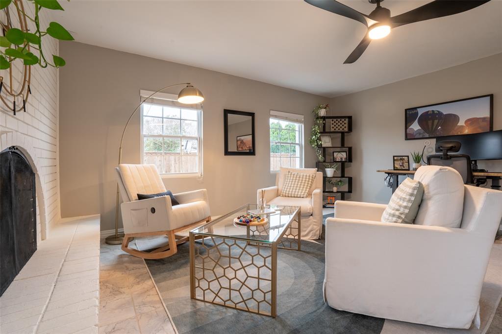 3124 Barton Road Carrollton, TX 75007 - Photo 14 of 36 a living room with furniture and a flat screen tv