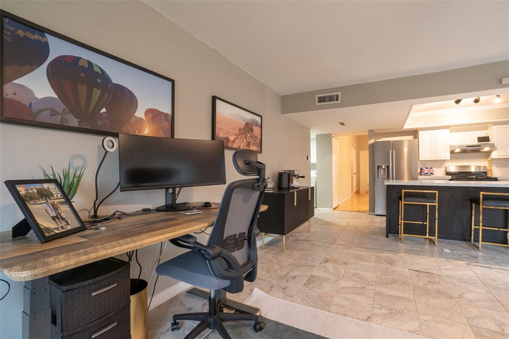 3124 Barton Road Carrollton, TX 75007 - Photo 17 of 36 a view of a workspace with furniture