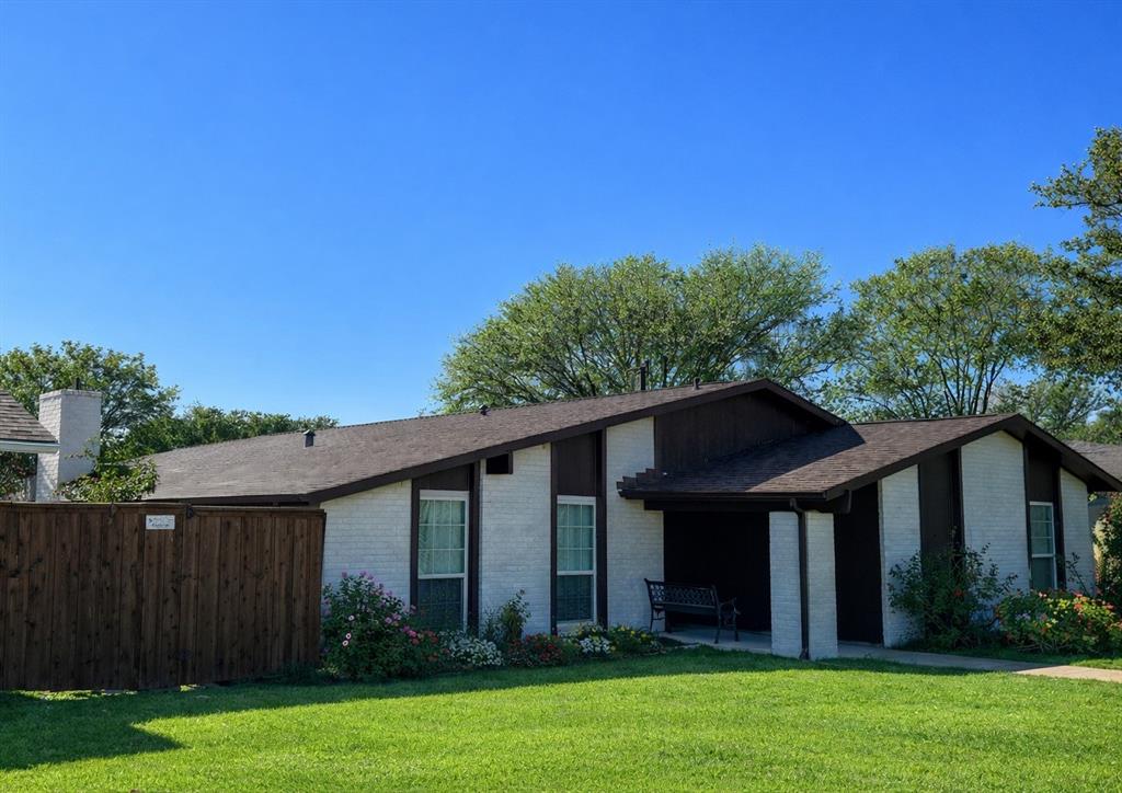 3124 Barton Road Carrollton, TX 75007 - Photo 2 of 36 a house with garden in front of it