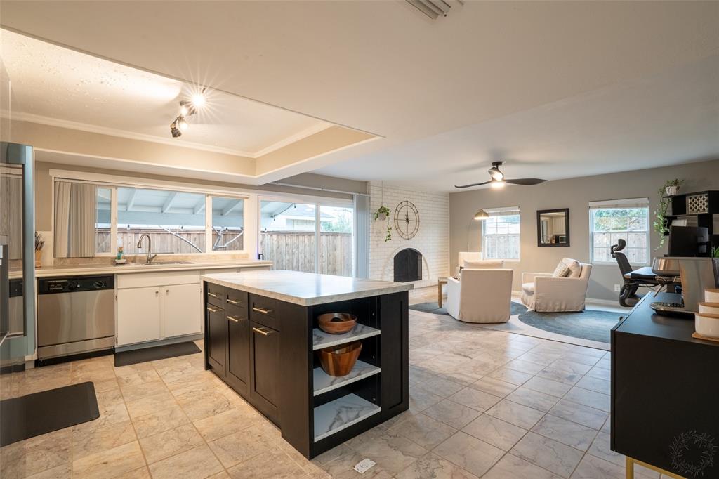 3124 Barton Road Carrollton, TX 75007 - Photo 36 of 36 a kitchen with a sink counter top space and appliances