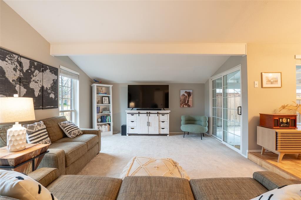 3124 Barton Road Carrollton, TX 75007 - Photo 7 of 36 a living room with furniture and a flat screen tv