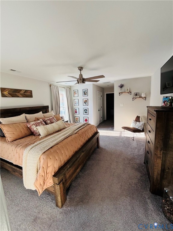 2211 Silver Street Aylett, VA 23009 - Photo 12 of 23 a spacious bedroom with a bed and a tv