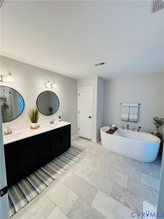 2211 Silver Street Aylett, VA 23009 - Photo 13 of 23 a living room with two chairs