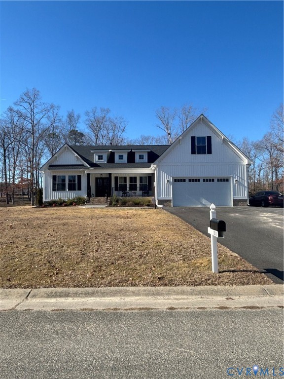 2211 Silver Street Aylett, VA 23009 - Photo 2 of 23 a front view of a house with a yard