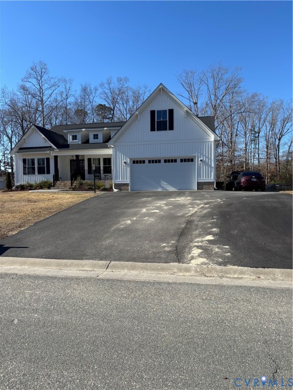2211 Silver Street Aylett, VA 23009 - Photo 3 of 23 a view of a house with a yard