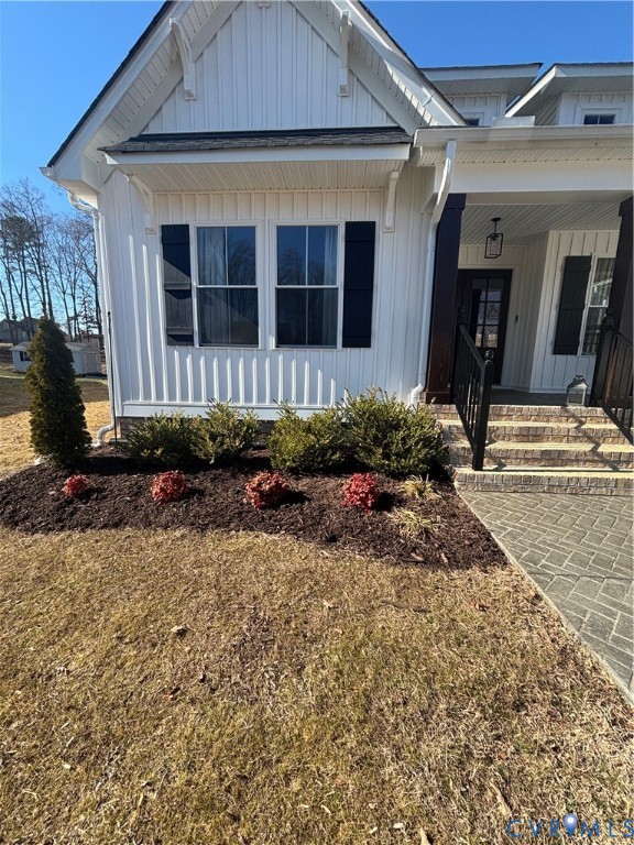 2211 Silver Street Aylett, VA 23009 - Photo 5 of 23 a front view of a house with garden