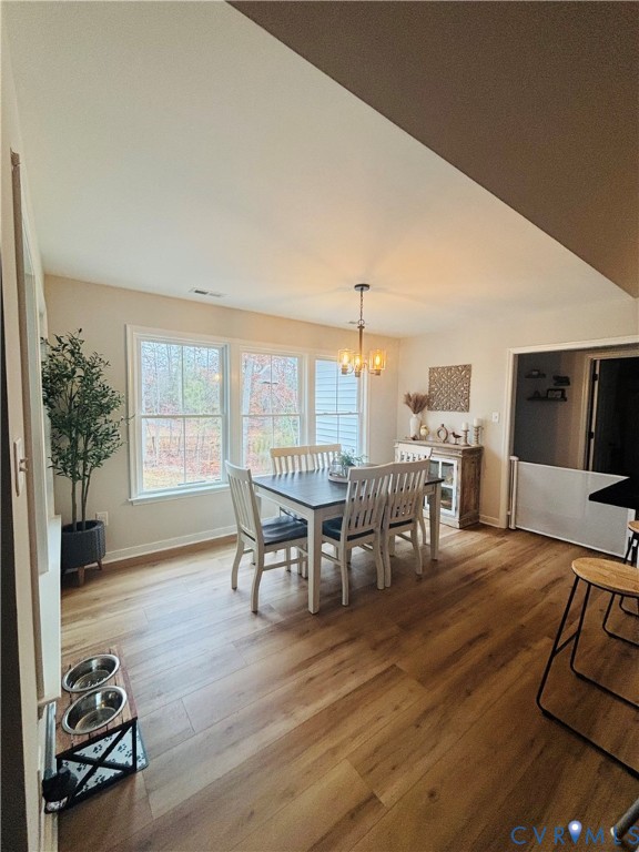 2211 Silver Street Aylett, VA 23009 - Photo 9 of 23 a dining room with furniture and wooden floor