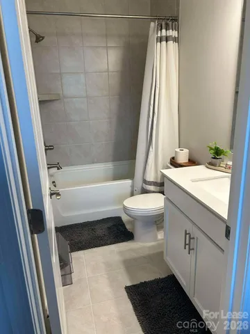 a bathroom with a sink a toilet and a bathtub