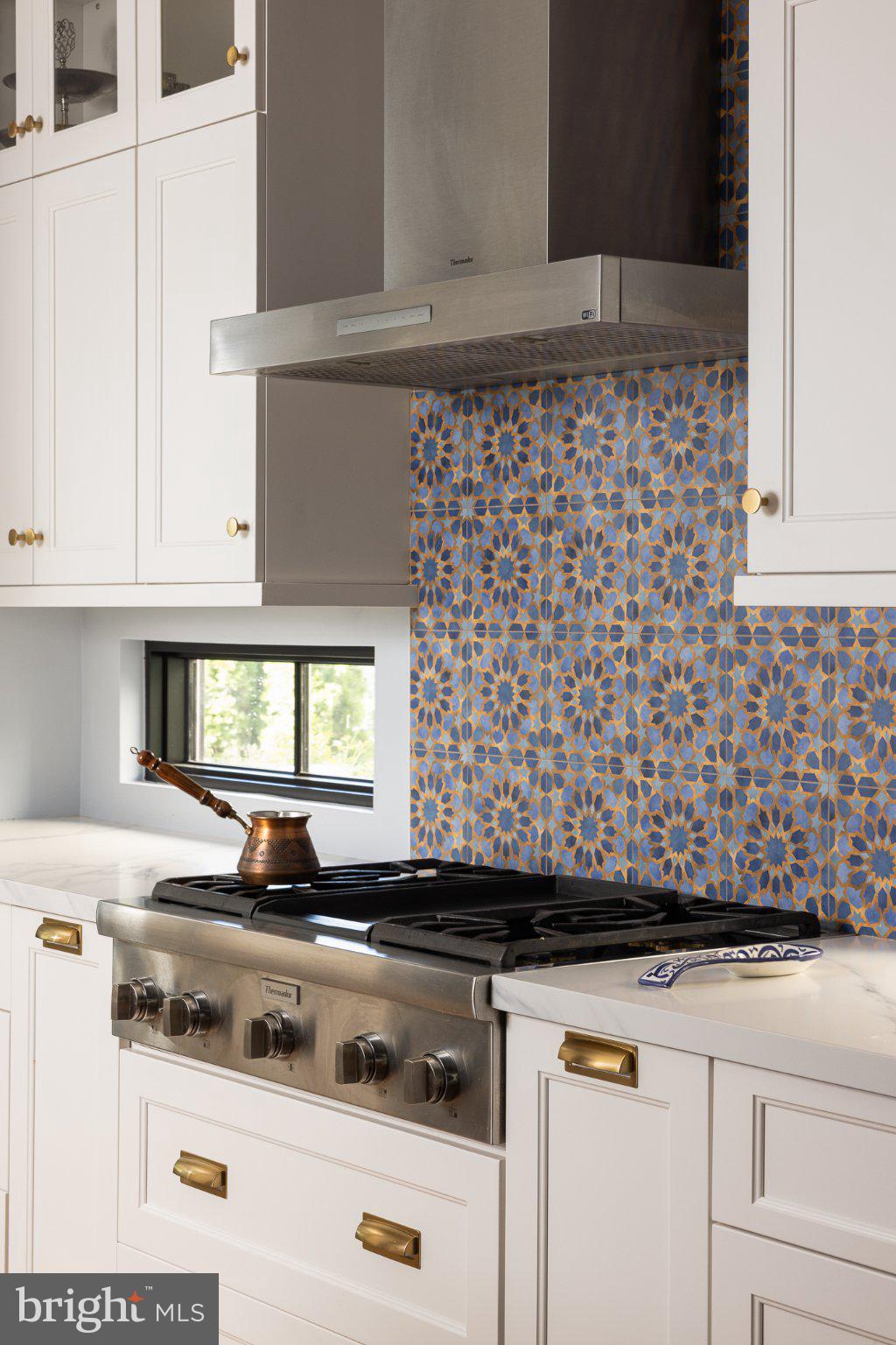 4905 16th Road North Arlington, VA 22207 - Photo 5 of 19 Charming kitchen with vibrant tile accents.