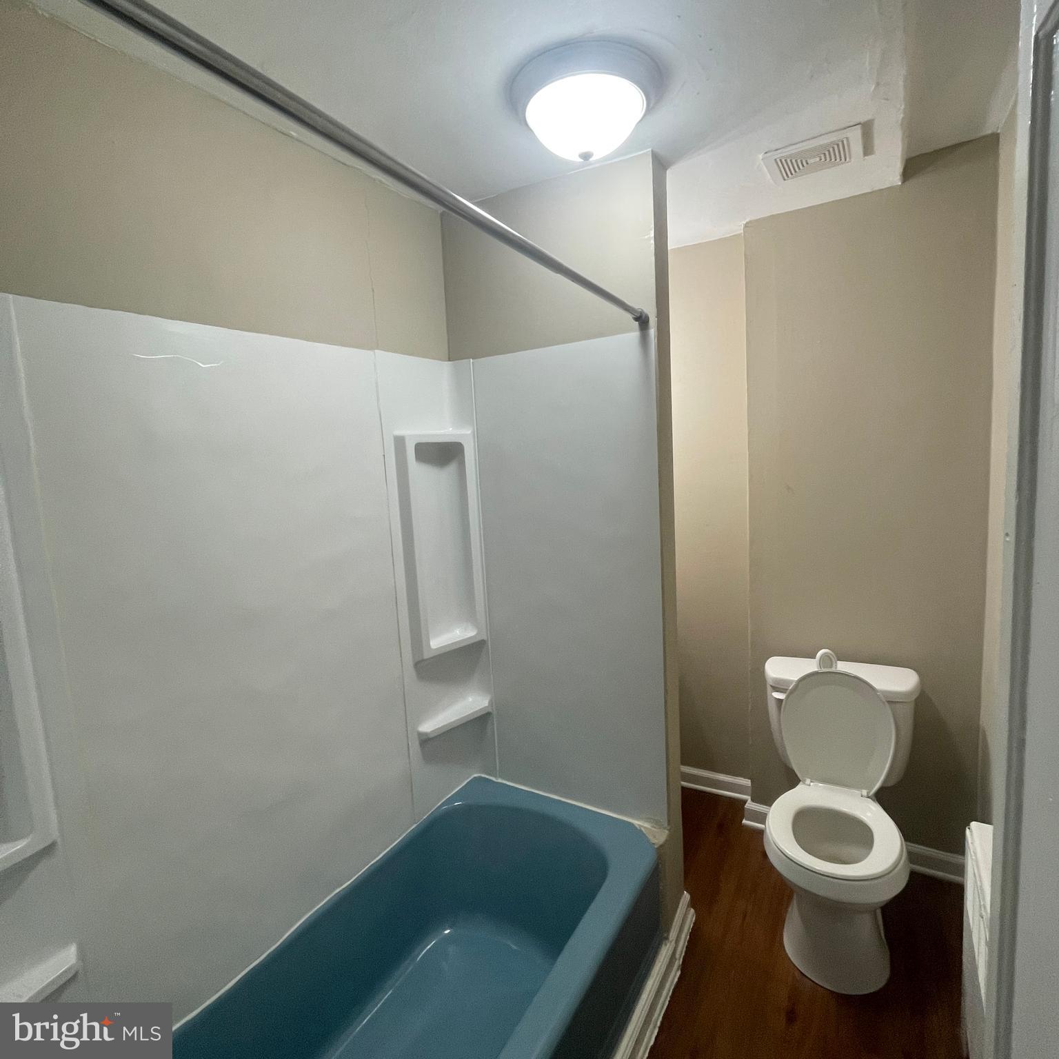 4971 Kershaw Street, Unit 4 Philadelphia, PA 19131 - Photo 7 of 7 a bathroom with a toilet and a shower