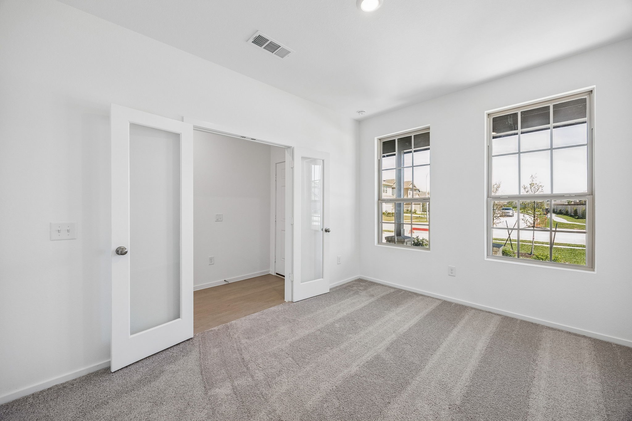 15015 Rustic Moon Road Conroe, TX 77302 - Photo 14 of 34 a view of an empty room with a window