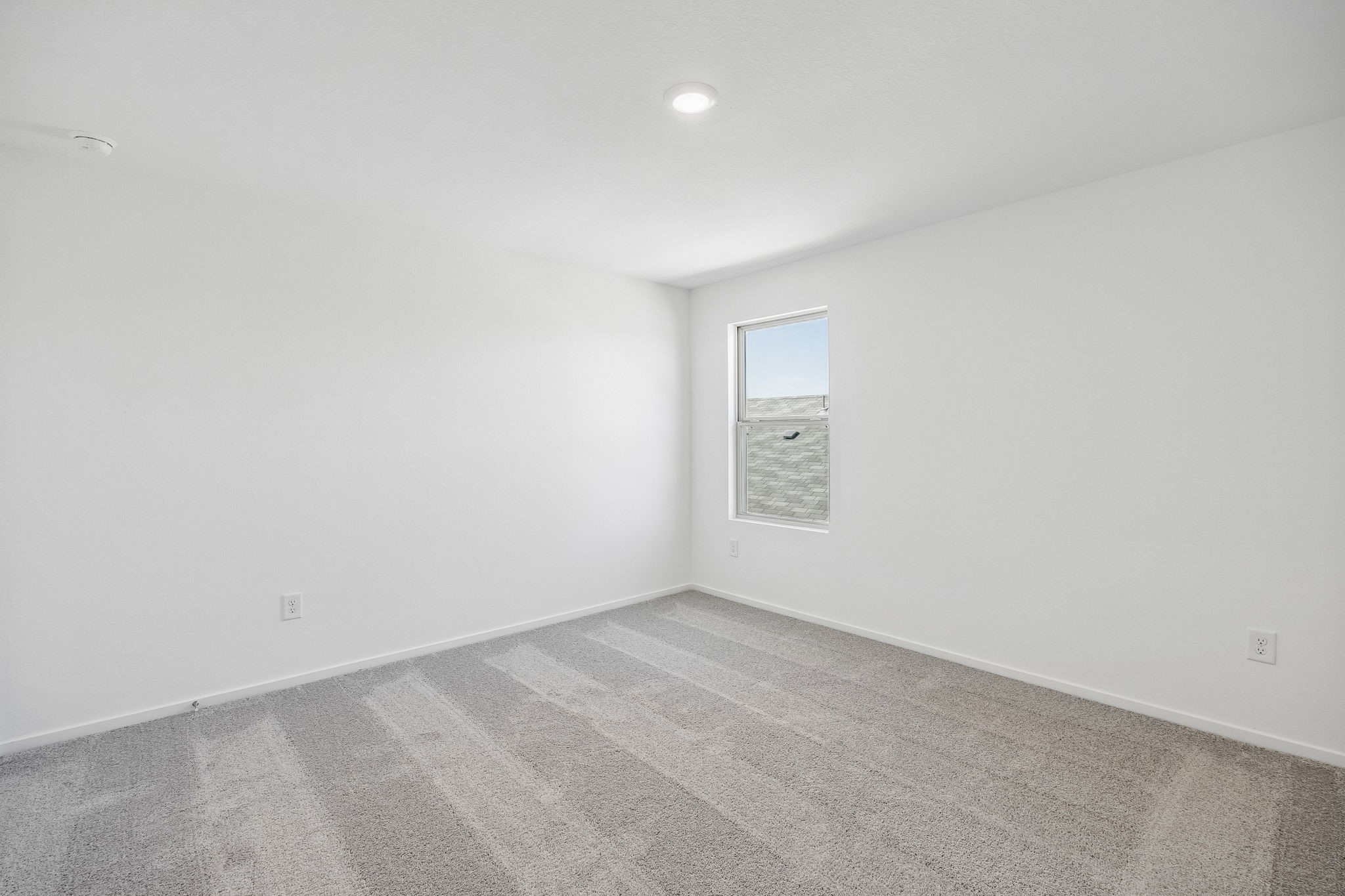 15015 Rustic Moon Road Conroe, TX 77302 - Photo 20 of 34 an empty room with a empty space and a window