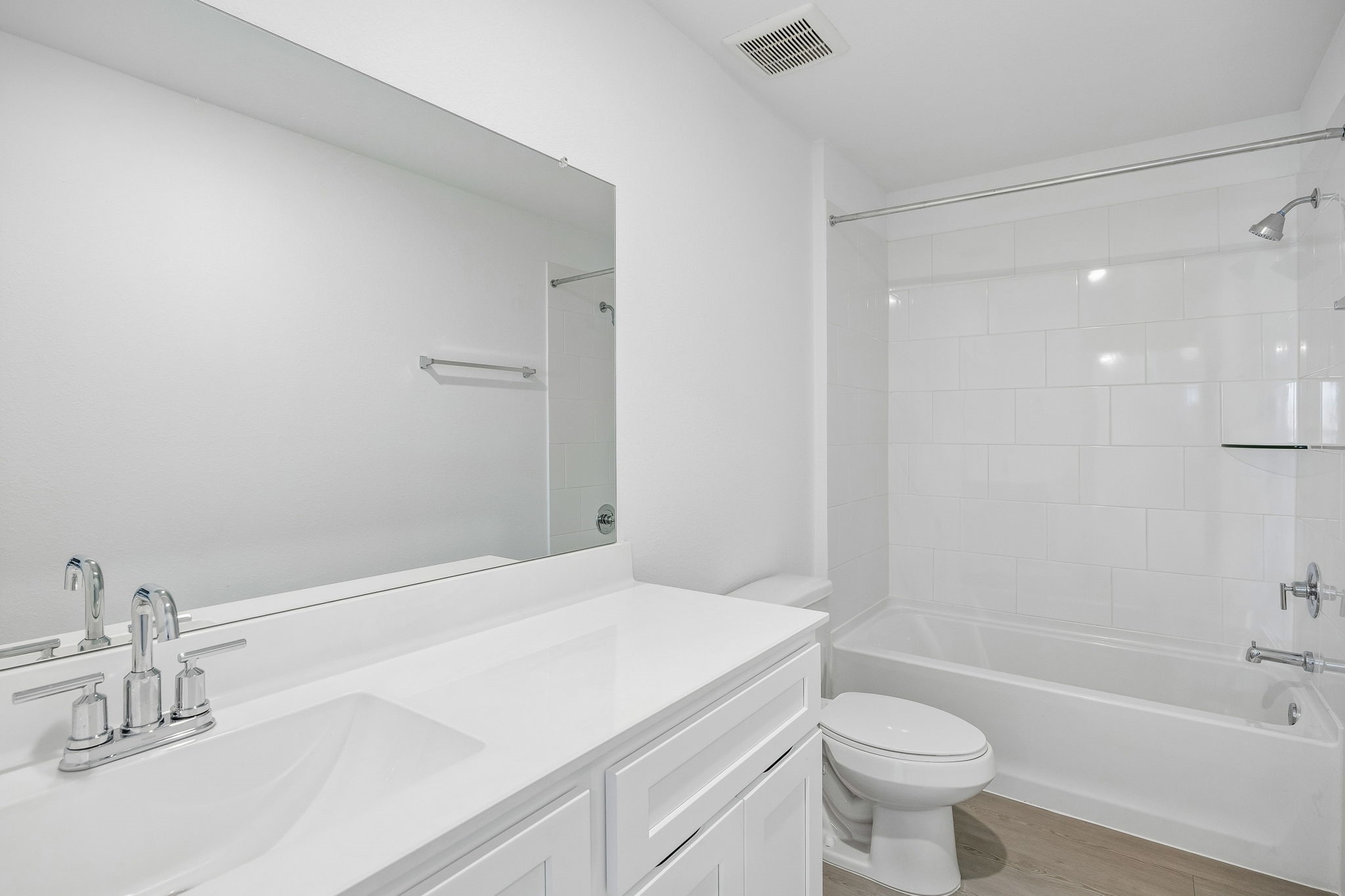 15015 Rustic Moon Road Conroe, TX 77302 - Photo 22 of 34 a bathroom with a sink a toilet and shower