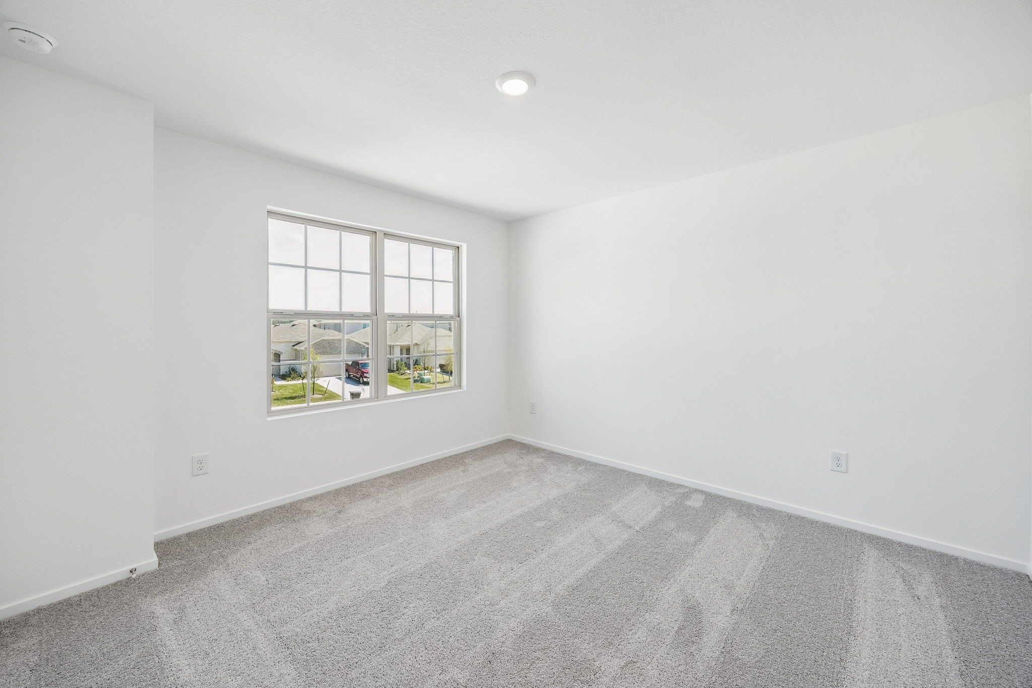 15015 Rustic Moon Road Conroe, TX 77302 - Photo 23 of 34 an empty room with windows