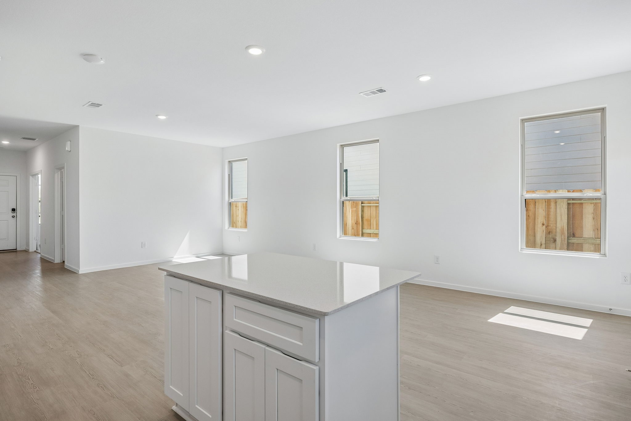 15015 Rustic Moon Road Conroe, TX 77302 - Photo 8 of 34 a view of kitchen and front door
