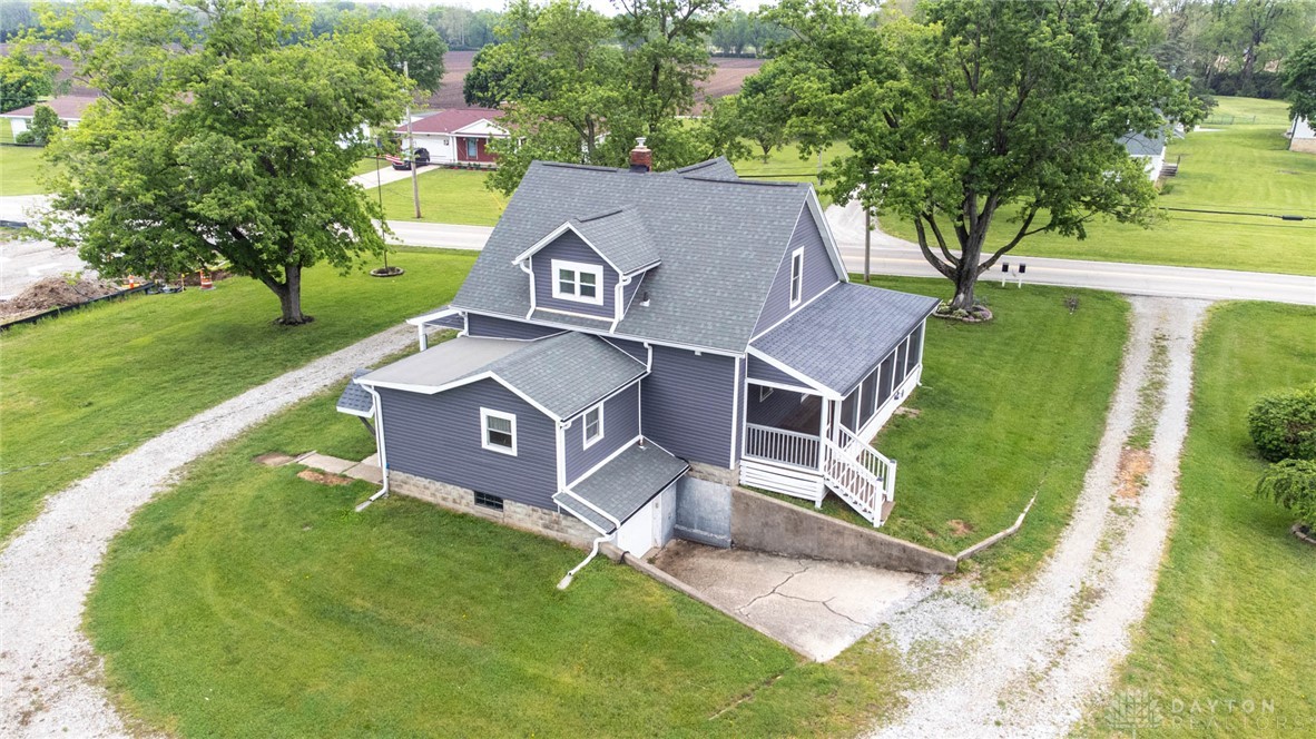 190 Swailes Road Troy, OH 45373 - Photo 50 of 82 This charming home features a well-maintained exterior with a inviting screened porch.