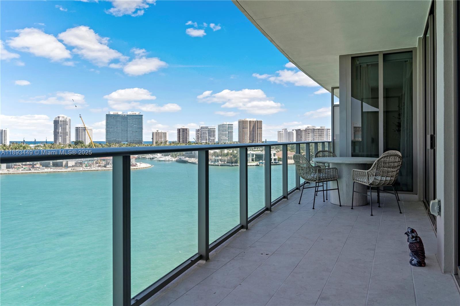 1135 103rd Street, Unit PH2 Bay Harbor Islands, FL 33154 - Photo 19 of 20 a view of a terrace with sitting area