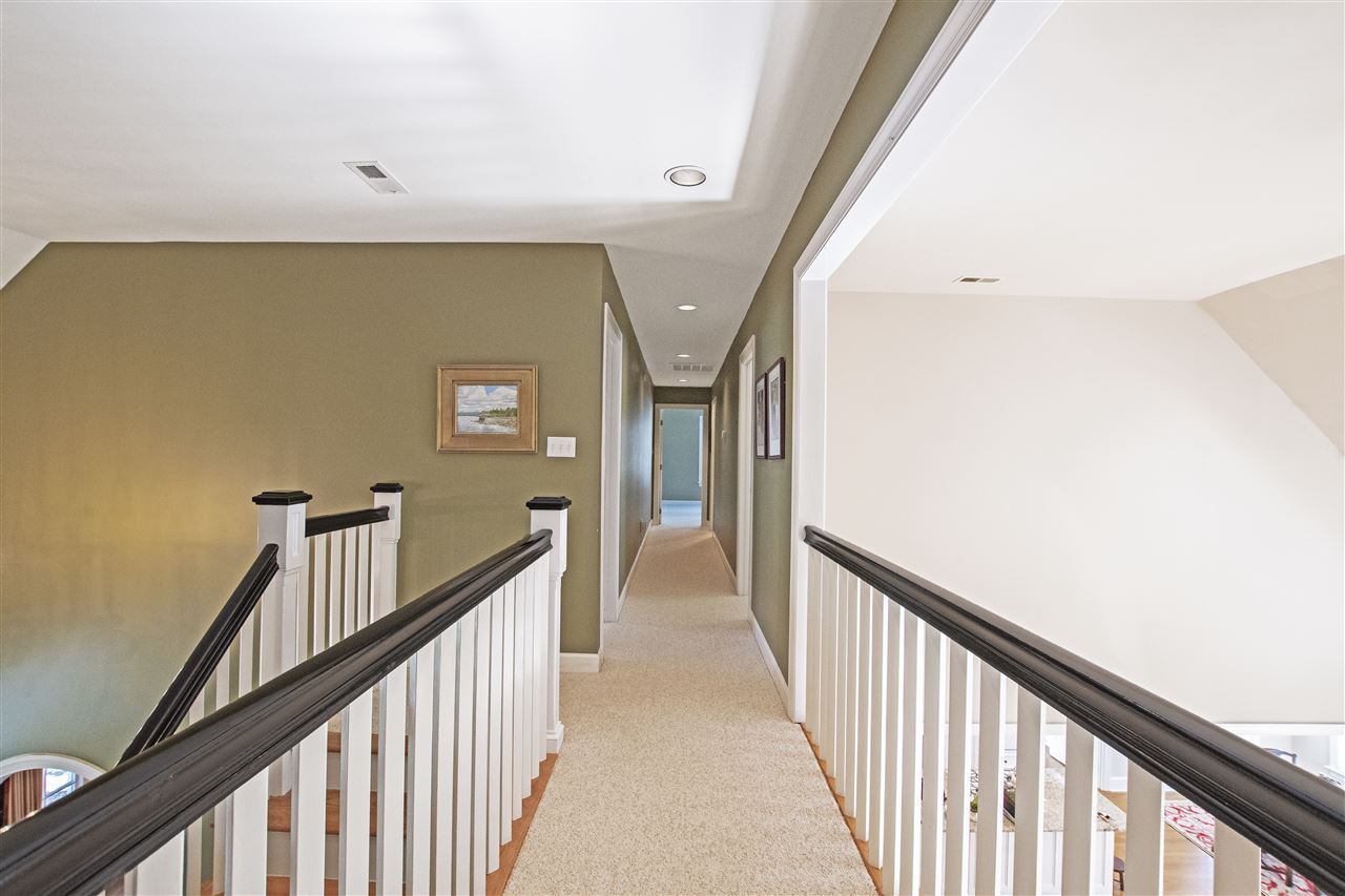 5817 Laurel Rock Lane Raleigh, NC 27613 - Photo 17 of 30 The landing at the top of the stairs has beautiful views of the front foyer area and great room. Secondary bedrooms and the bonus room are all on the second floor with access from the hallway and back stairs. Upstairs Hallway