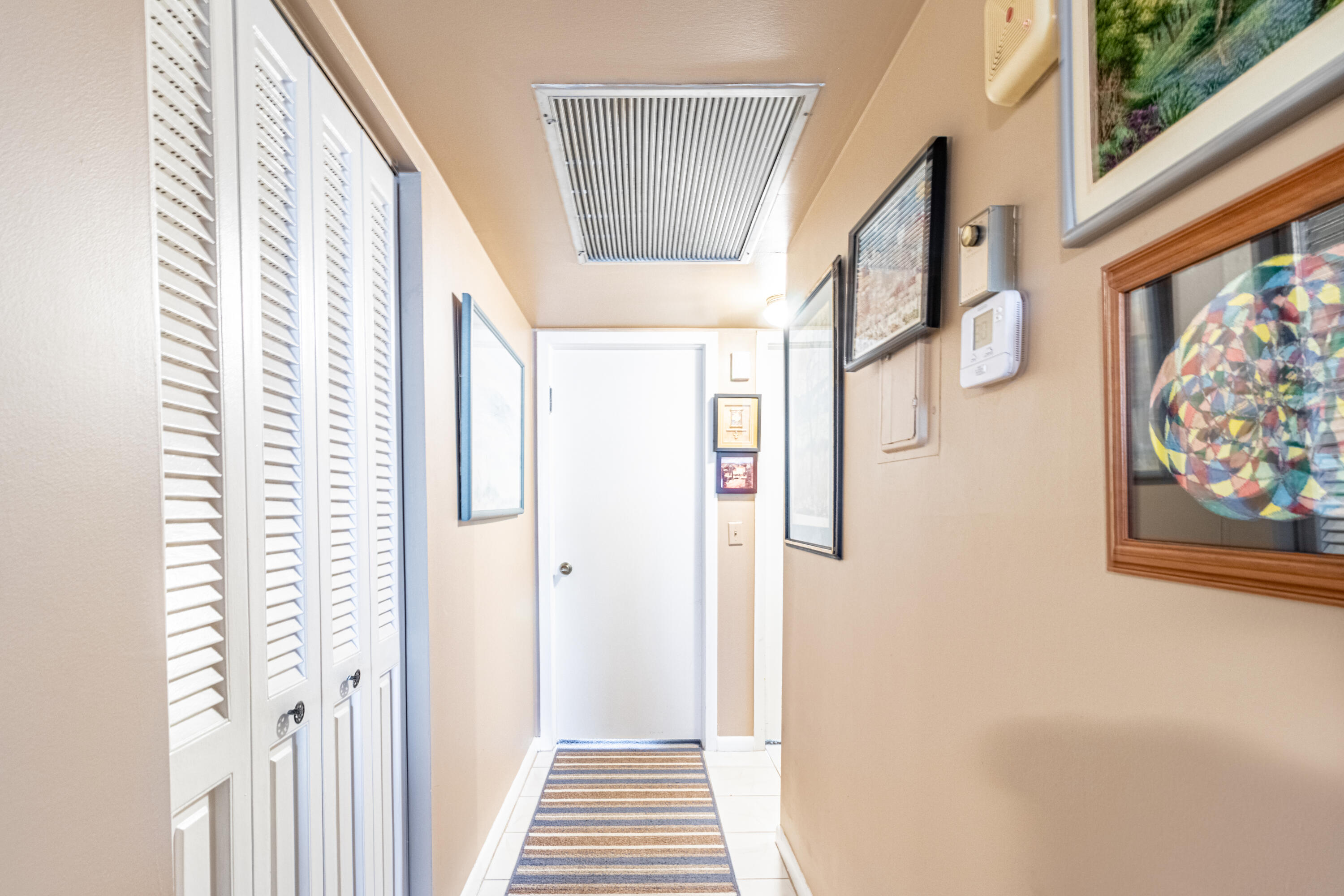 1050 Newcastle A Boca Raton, FL 33434 - Photo 8 of 45 Bright and wide hallway