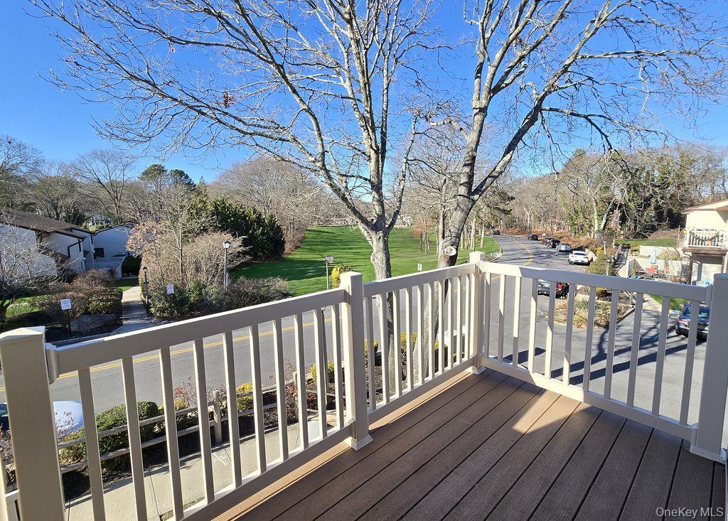 79 Birchwood Road Coram, NY 11727 - Photo 2 of 12 a view of a wooden roof deck