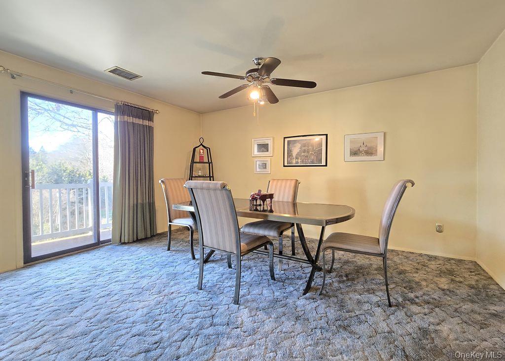 79 Birchwood Road Coram, NY 11727 - Photo 6 of 12 a view of a workspace with furniture and a window
