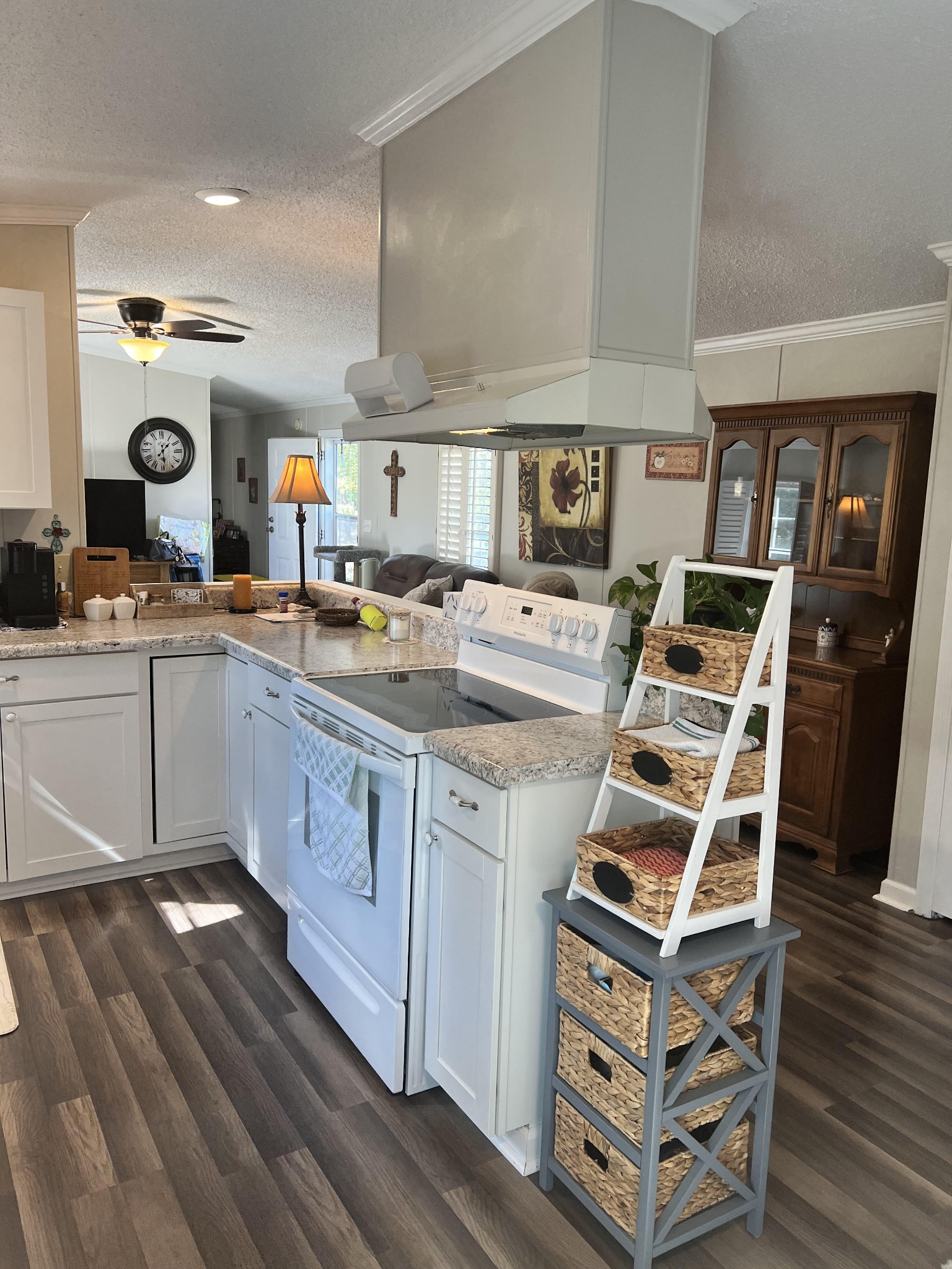 20002 Cessna Road Bon Aqua, TN 37025 - Photo 15 of 28 a open kitchen with stainless steel appliances a stove a sink and a refrigerator