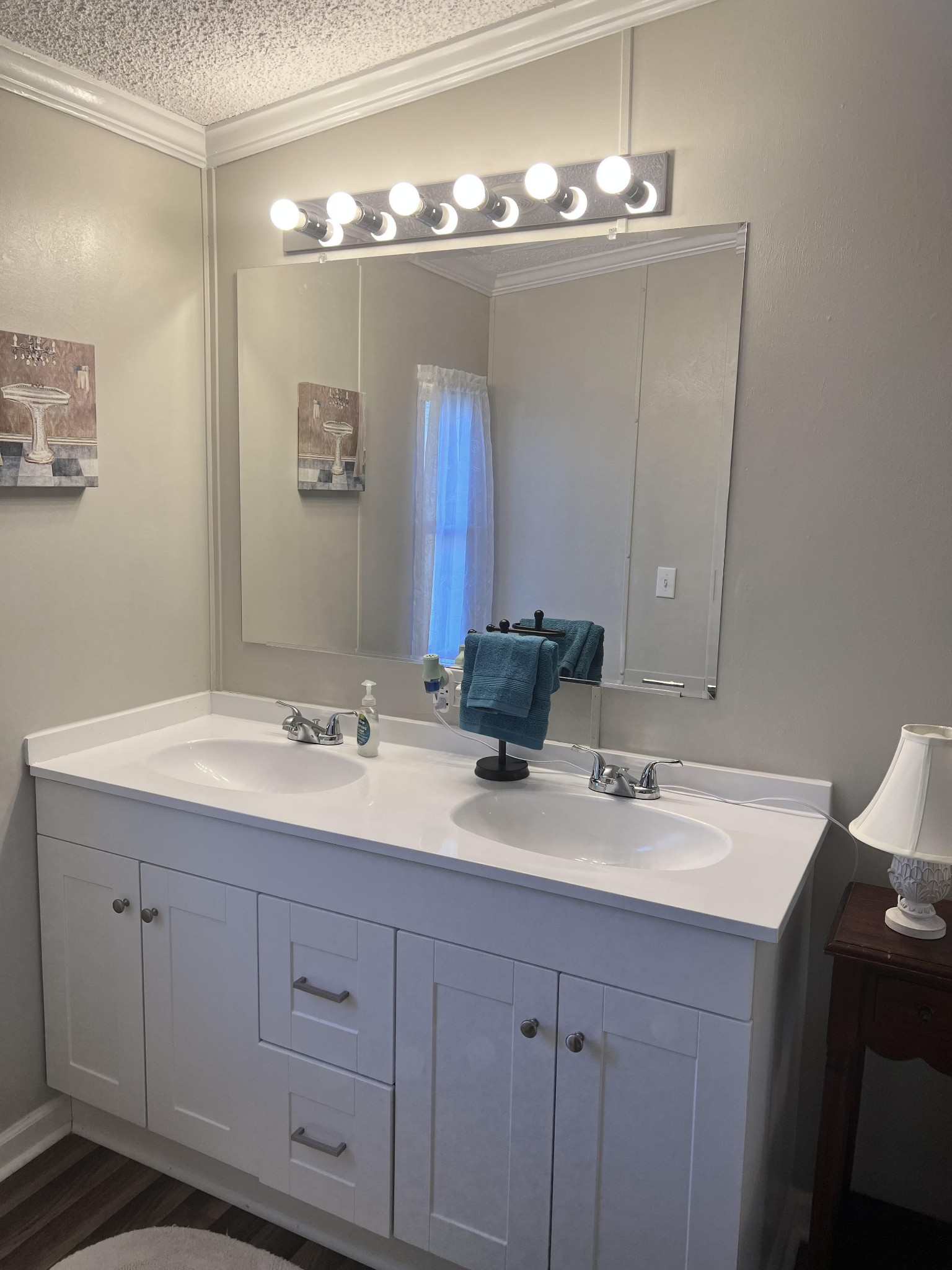 20002 Cessna Road Bon Aqua, TN 37025 - Photo 19 of 28 a bathroom with a sink and a mirror