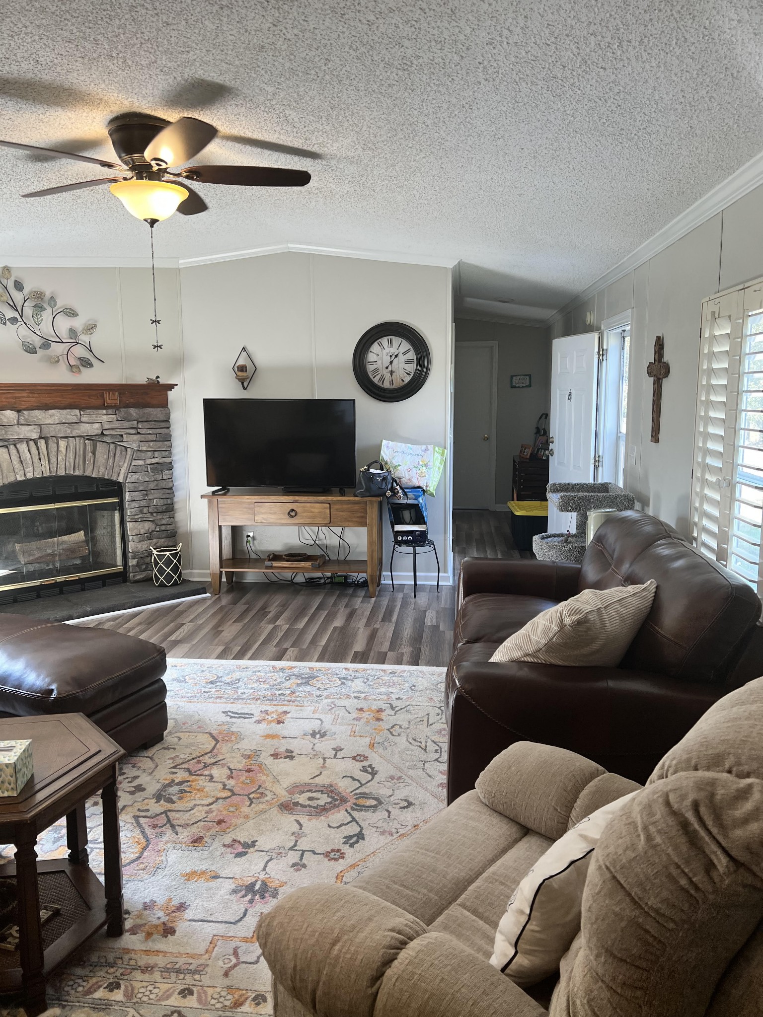 20002 Cessna Road Bon Aqua, TN 37025 - Photo 21 of 28 a living room with furniture and a fireplace