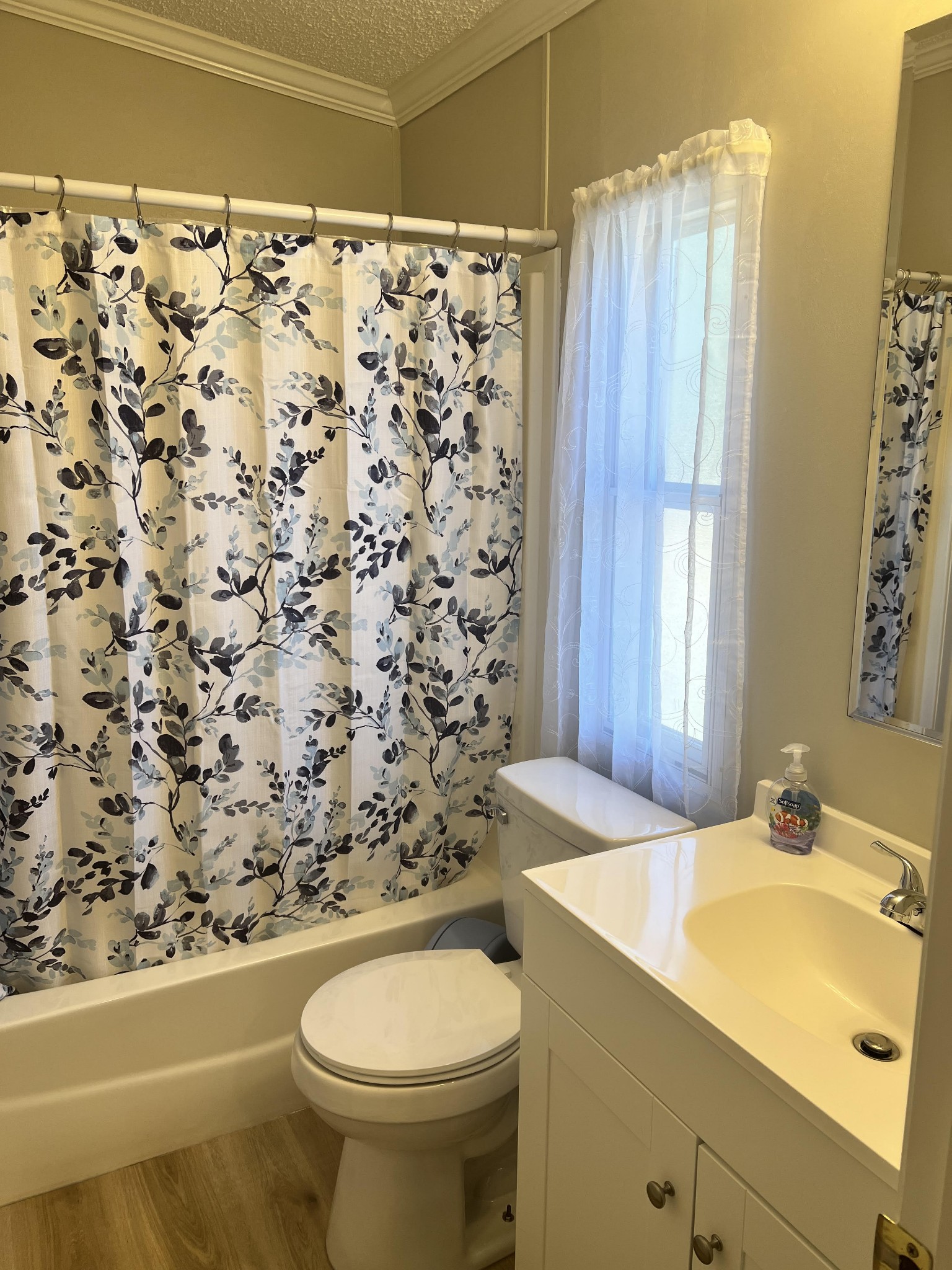 20002 Cessna Road Bon Aqua, TN 37025 - Photo 23 of 28 a bathroom with a sink toilet and shower