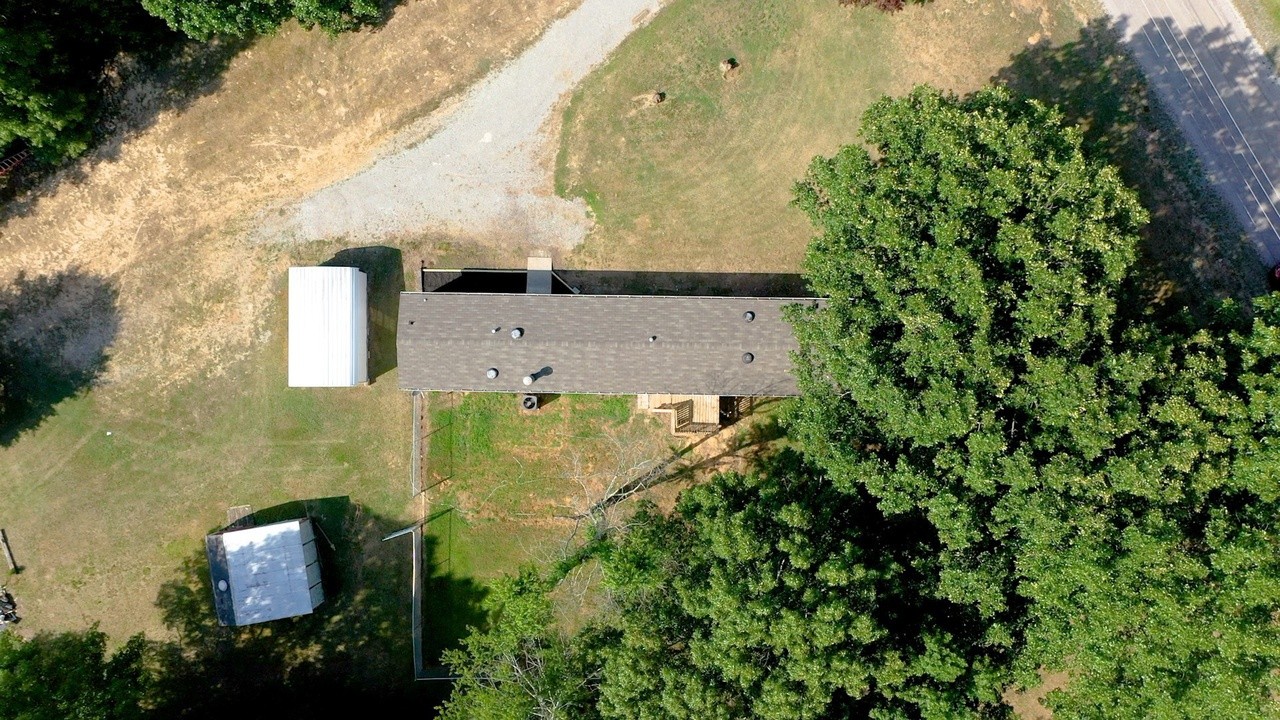 20002 Cessna Road Bon Aqua, TN 37025 - Photo 5 of 28 an aerial view of residential house with outdoor space and trees all around