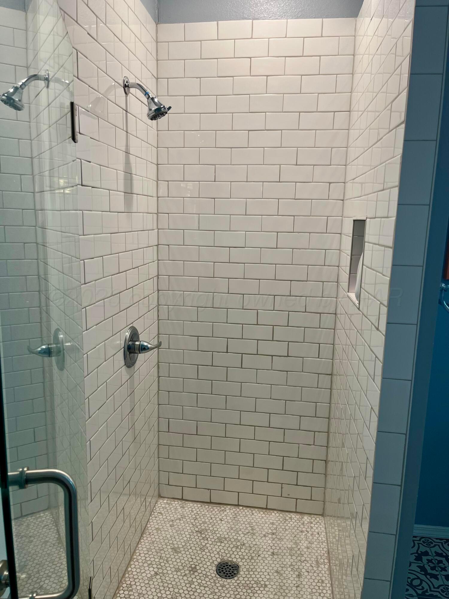 2011 5th Avenue Canyon, TX 79015 - Photo 10 of 12 a bathroom with a shower