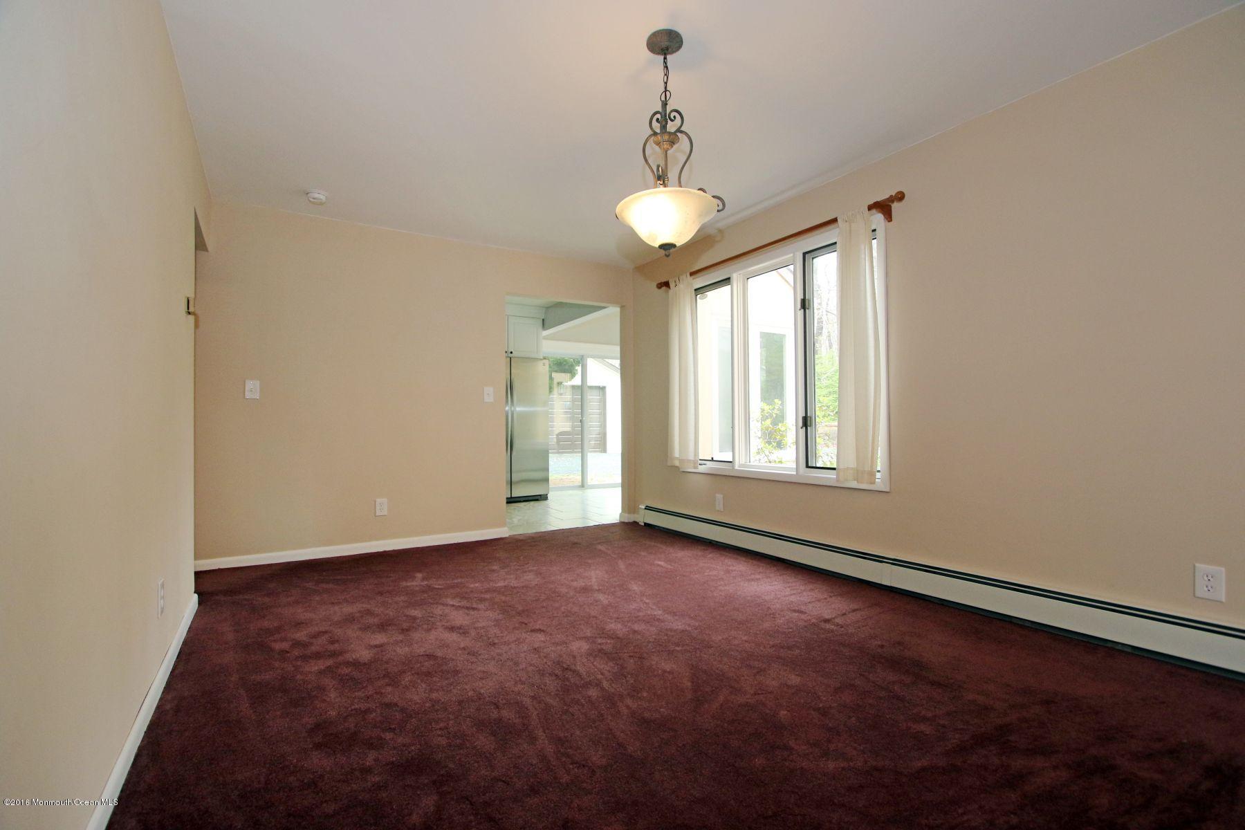 186 Pinebrook Road Tinton Falls, NJ 07724 - Photo 23 of 41 a view of an empty room with a window