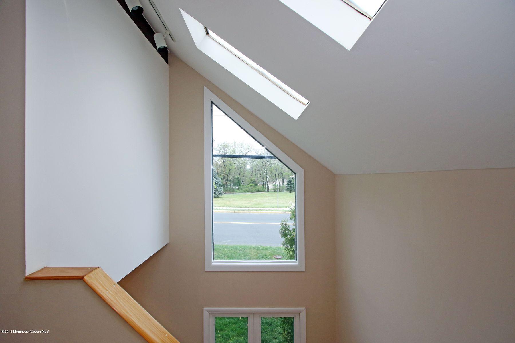 186 Pinebrook Road Tinton Falls, NJ 07724 - Photo 29 of 41 a view of an empty room with a window