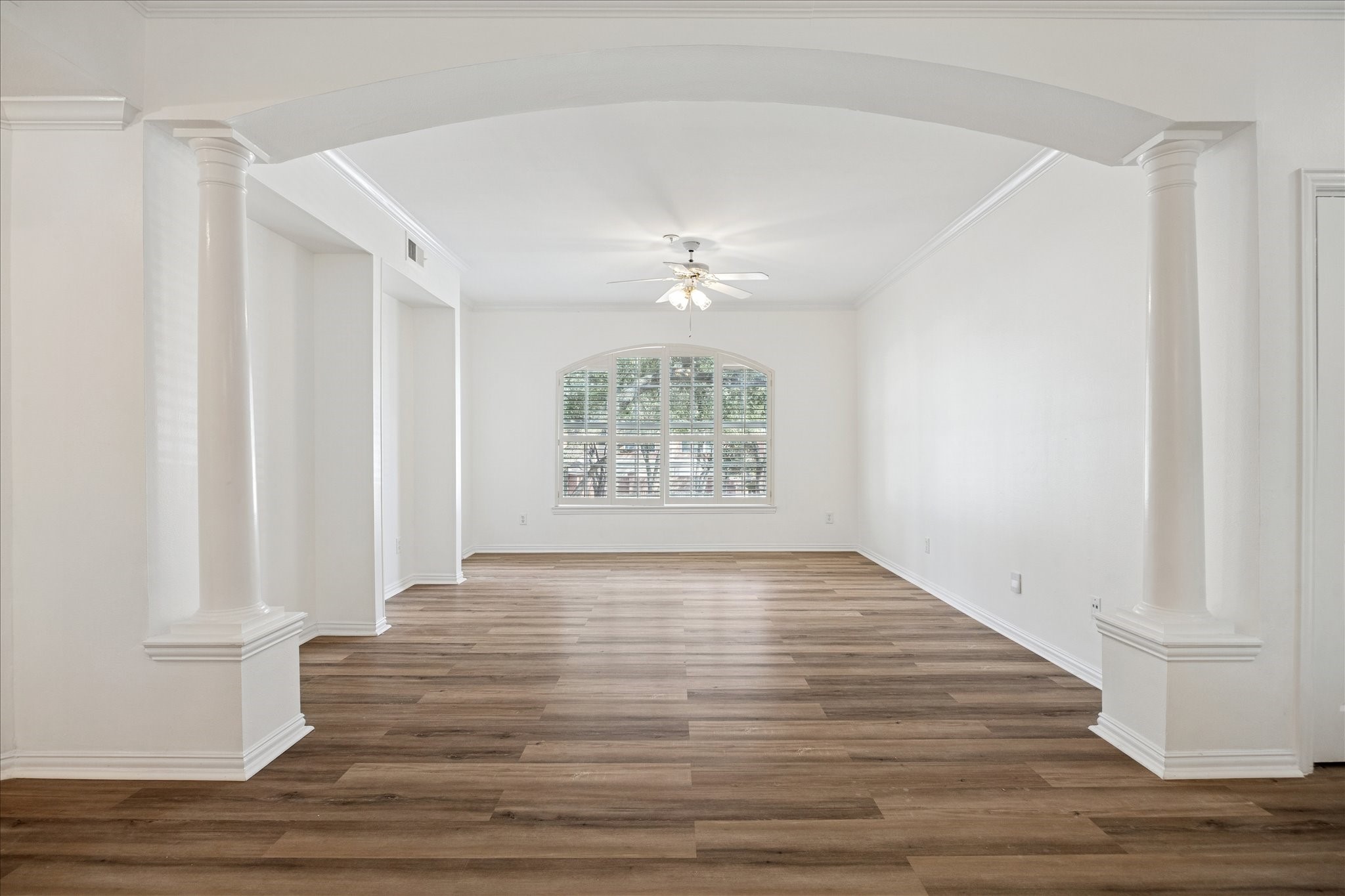 2111 Welch Street, Unit A103 Houston, TX 77019 - Photo 18 of 24 a view of an entryway with wooden floor