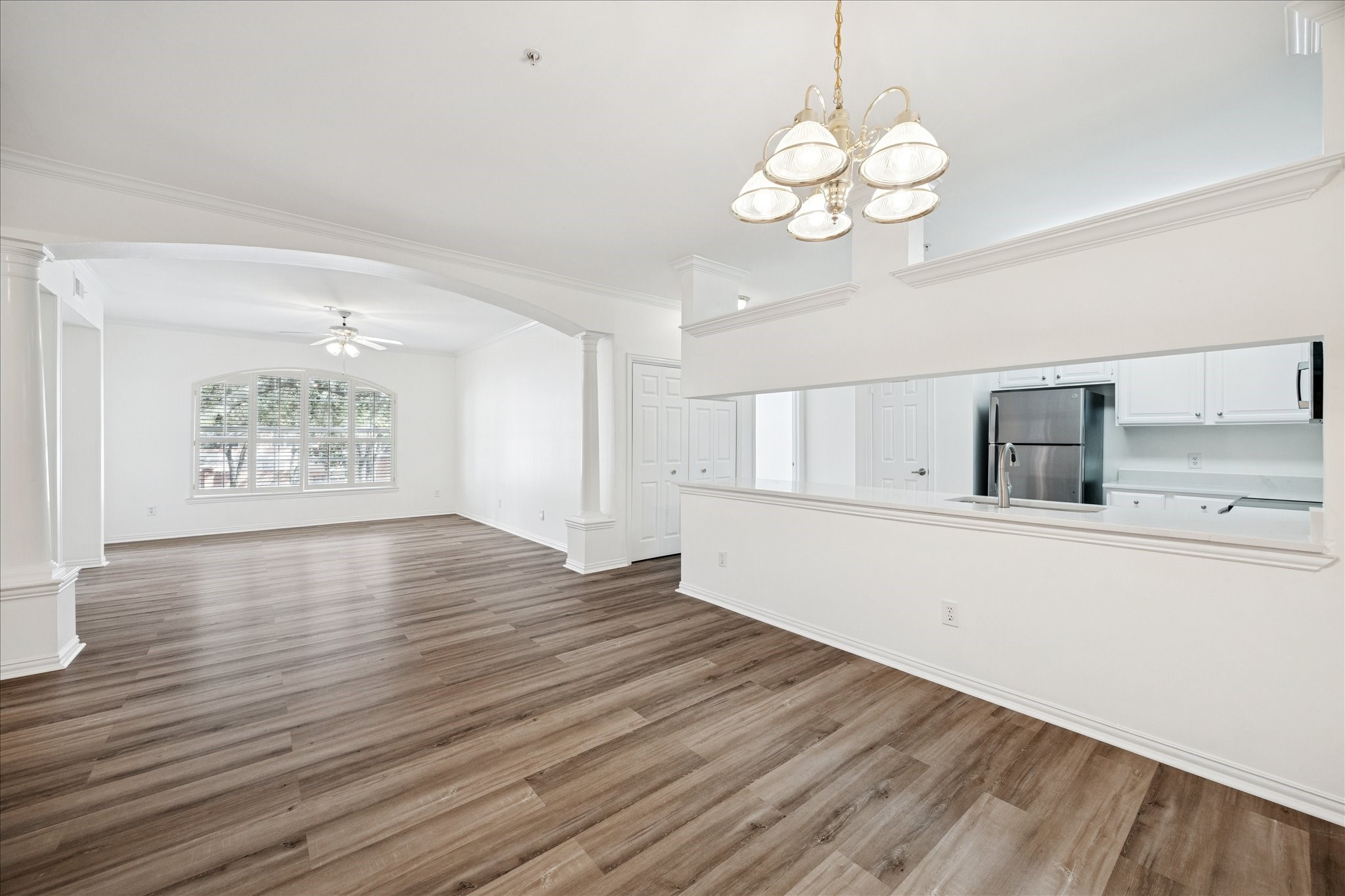 2111 Welch Street, Unit A103 Houston, TX 77019 - Photo 19 of 24 a view of kitchen and wooden floor