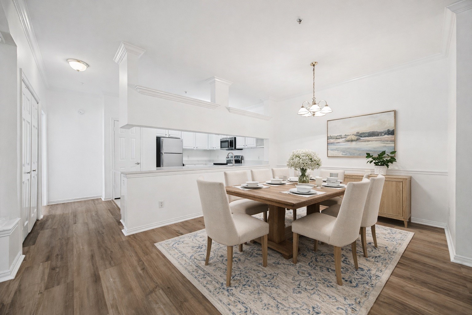 2111 Welch Street, Unit A103 Houston, TX 77019 - Photo 3 of 24 a view of a dining room with furniture
